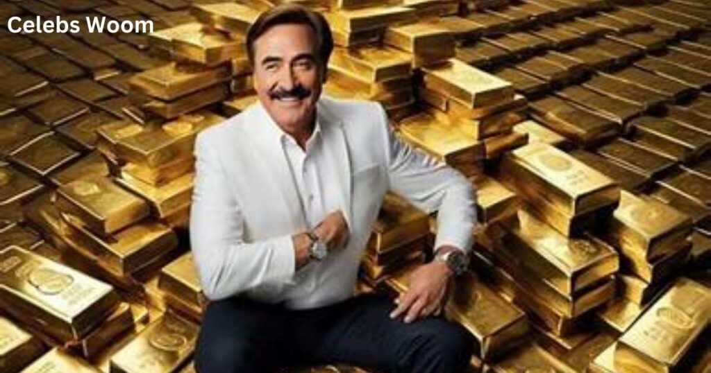 Person sitting amid piles of gold bars, wearing a white shirt and watch.